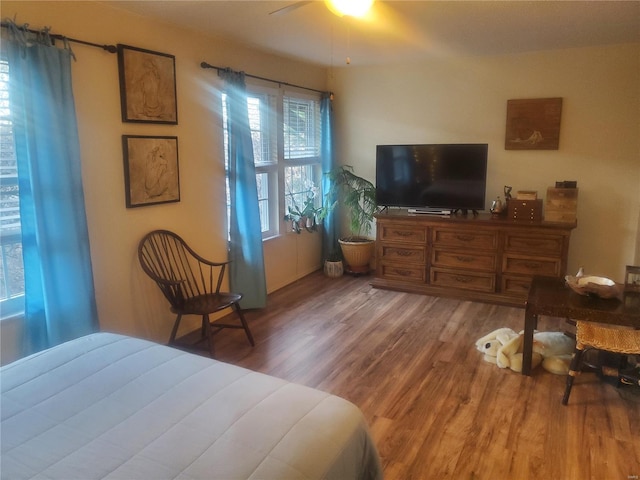 bedroom featuring ceiling fan and wood finished floors