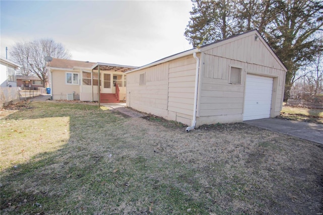 exterior space with driveway and fence