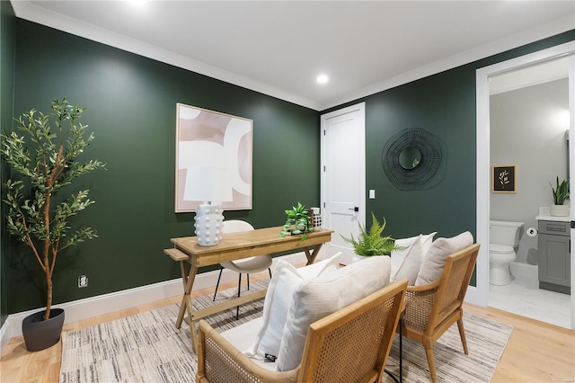 office space featuring recessed lighting, light wood-style floors, and baseboards