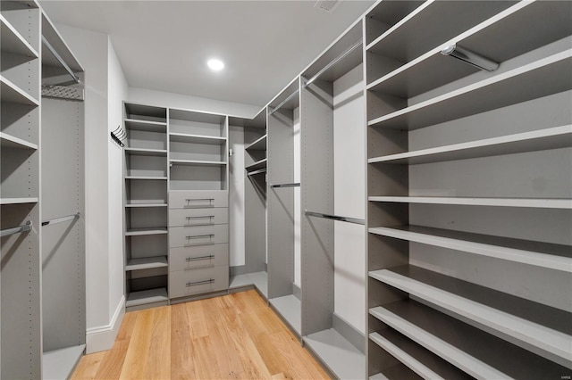 spacious closet with light wood-style flooring