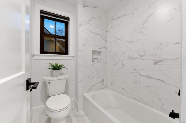 full bathroom featuring  shower combination, toilet, baseboards, and marble finish floor