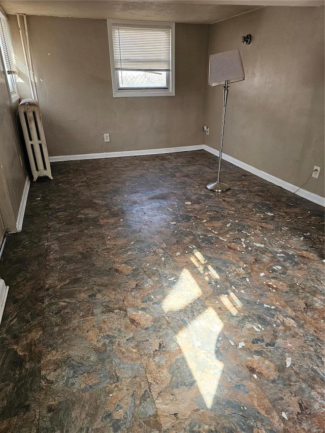 interior space featuring baseboards