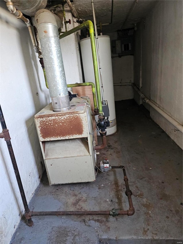 utility room with electric panel and gas water heater