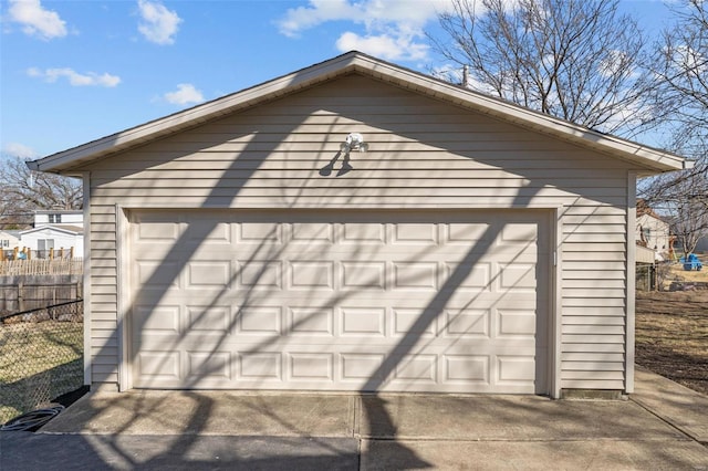 detached garage with fence