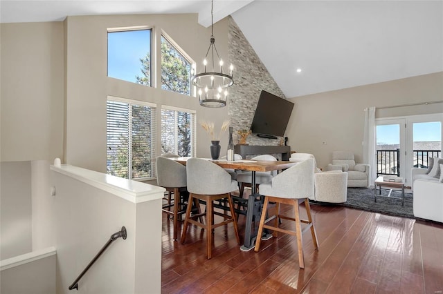 dining room with beam ceiling, recessed lighting, a notable chandelier, high vaulted ceiling, and dark wood-style flooring