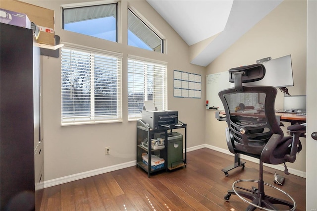 office featuring vaulted ceiling, baseboards, and hardwood / wood-style floors