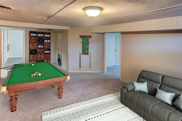 playroom featuring pool table, baseboards, carpet floors, and a textured ceiling