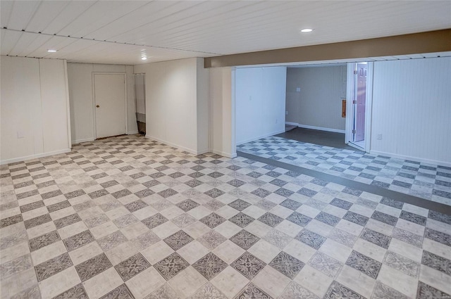 finished basement featuring light floors