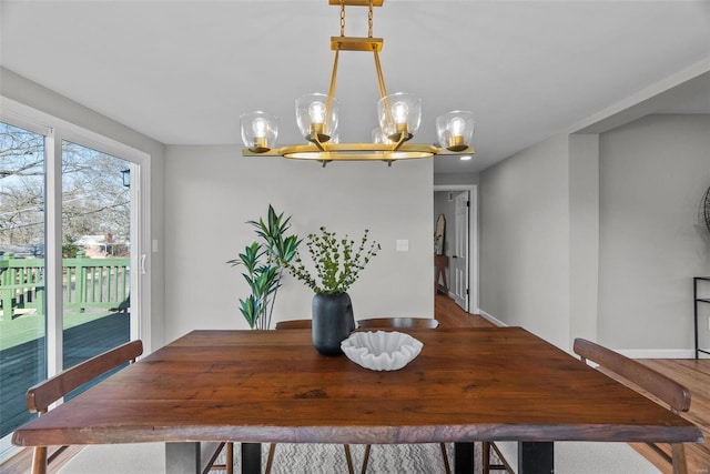 dining area featuring a chandelier