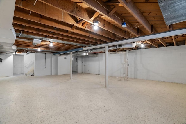 unfinished basement with stairway