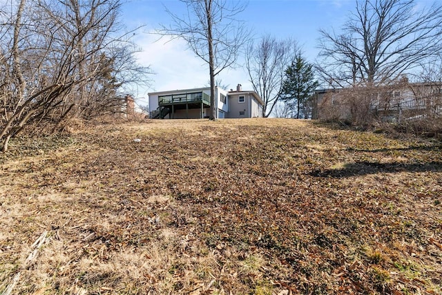 view of yard with a wooden deck