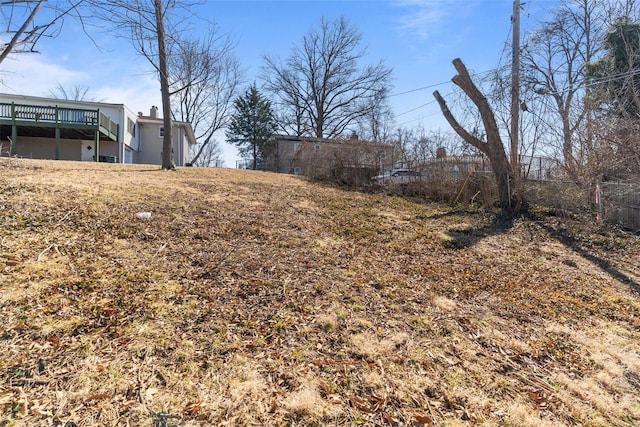 view of yard featuring a wooden deck