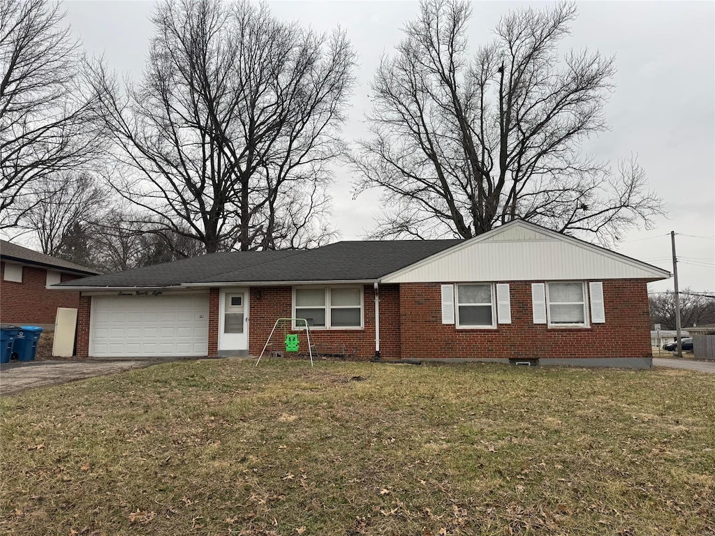 ranch-style house featuring aphalt driveway, a garage, brick siding, and a front lawn
