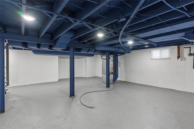 below grade area featuring heating unit