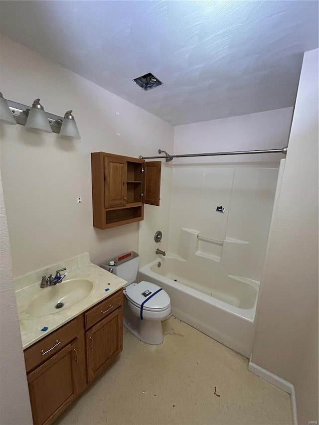 full bathroom featuring vanity, bathing tub / shower combination, and toilet