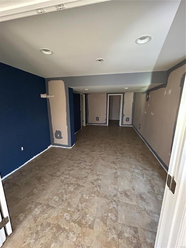 interior space with baseboards