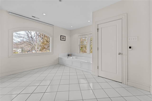 bathroom featuring visible vents, a garden tub, recessed lighting, tile patterned flooring, and baseboards