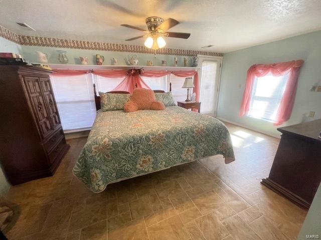 bedroom with a ceiling fan