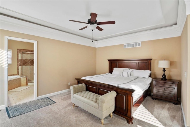 bedroom featuring visible vents, baseboards, ornamental molding, light carpet, and a raised ceiling