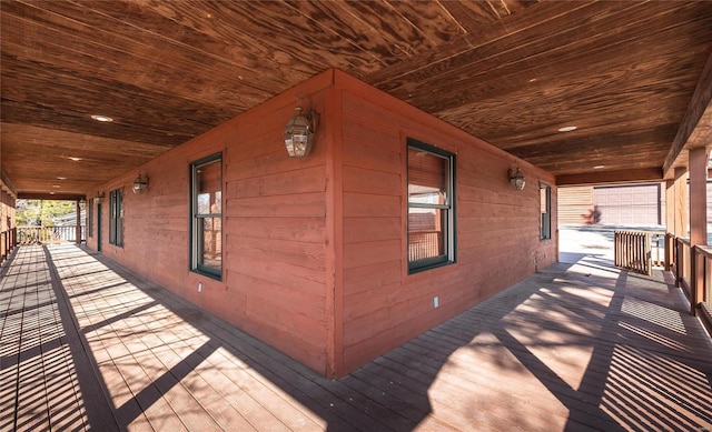 wooden terrace with a porch