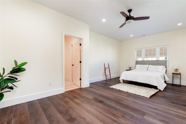 bedroom featuring visible vents, recessed lighting, wood finished floors, and baseboards