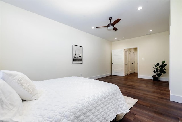 bedroom featuring a ceiling fan, wood finished floors, recessed lighting, and baseboards