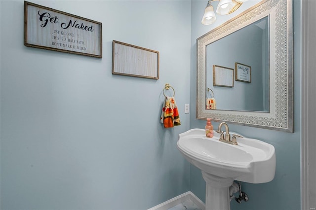 bathroom featuring baseboards