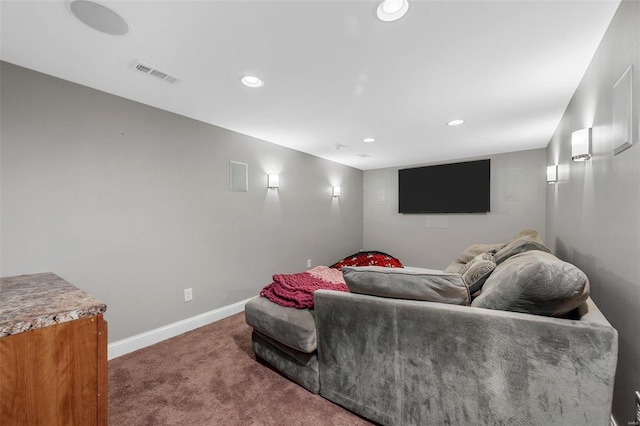 carpeted home theater room featuring visible vents, recessed lighting, and baseboards