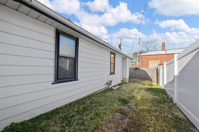 exterior space featuring a fenced backyard