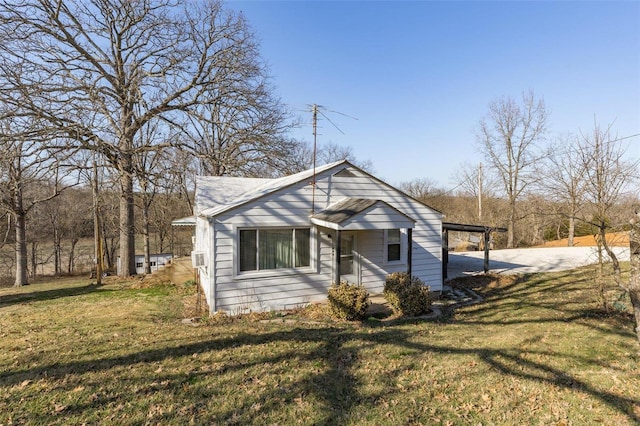 bungalow with a front yard