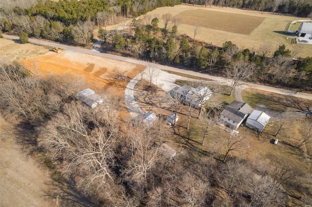 birds eye view of property featuring a rural view