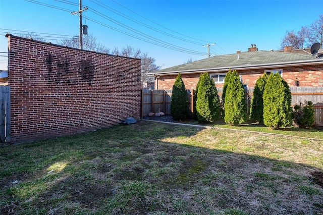 view of yard featuring fence