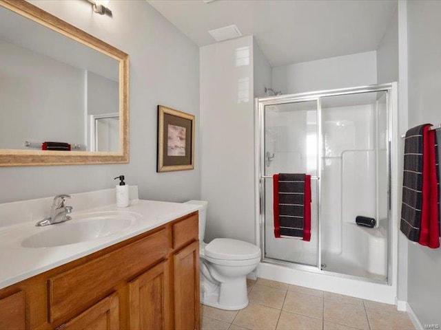 full bathroom with vanity, tile patterned floors, and a shower stall