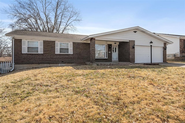 ranch-style house with a front lawn, concrete driveway, brick siding, and a garage