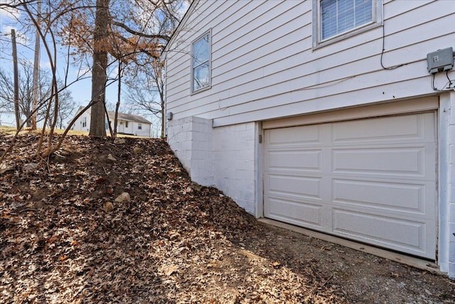 garage featuring driveway