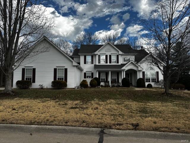 view of front of house with a front lawn