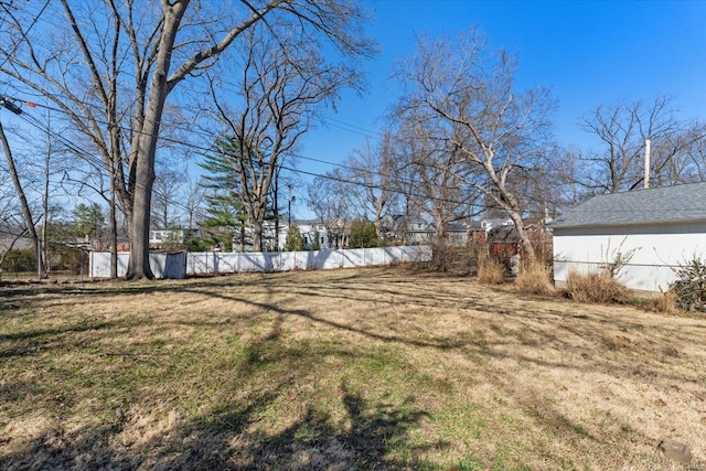 view of yard featuring fence