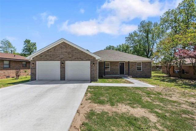 ranch-style home with concrete driveway, an attached garage, brick siding, and a front yard