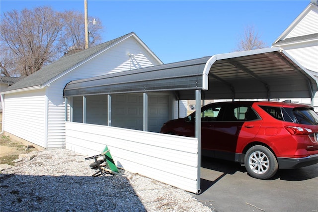 view of property exterior featuring a detached garage