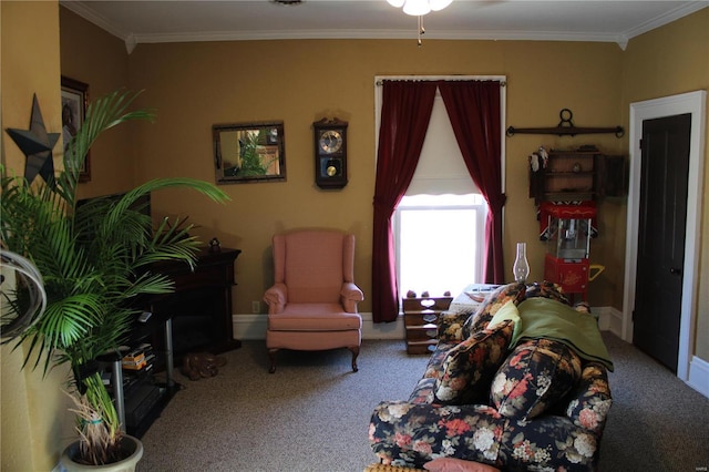 sitting room with baseboards, carpet floors, and ornamental molding