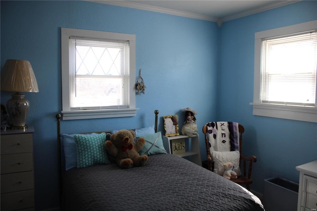 bedroom with ornamental molding