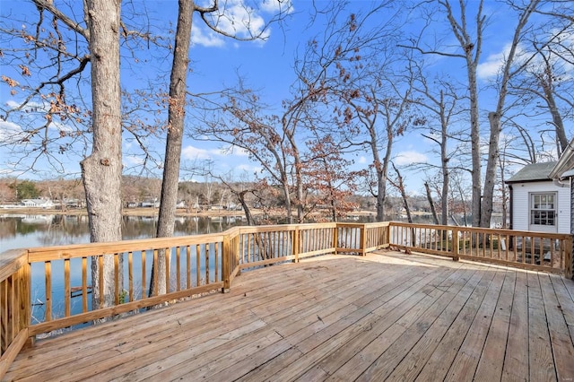 wooden terrace with a water view