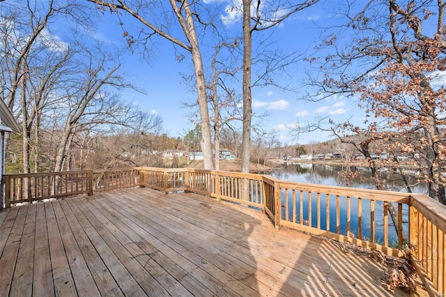 wooden deck with a water view