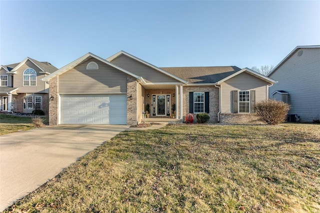 ranch-style home with brick siding, driveway, a front lawn, and a garage