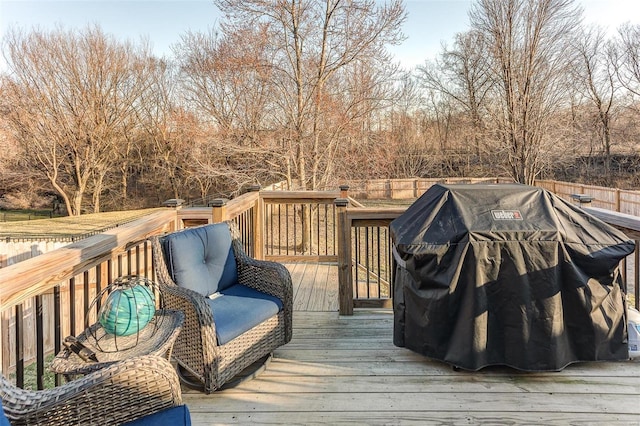 deck with grilling area and fence