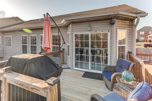 wooden deck featuring fence