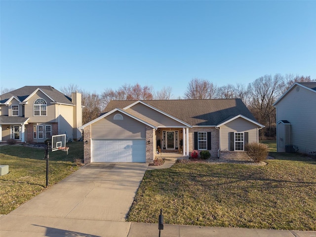 view of front facade featuring a front lawn, brick siding, a garage, and driveway