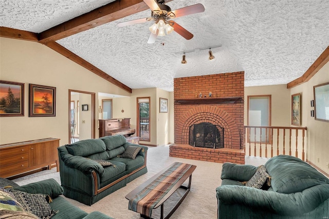 carpeted living room with a brick fireplace, a textured ceiling, lofted ceiling with beams, and a ceiling fan