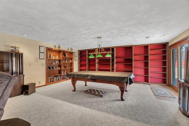 game room with billiards, carpet flooring, baseboards, and a textured ceiling