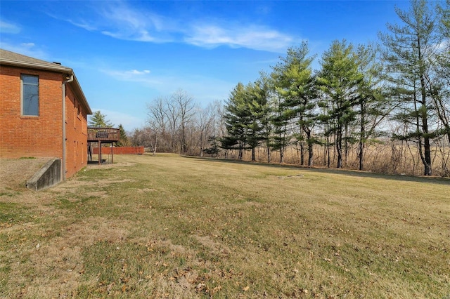 view of yard with a deck